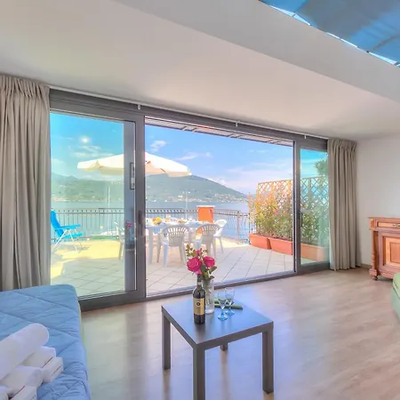 Red House: Beachfront Terrace & Private Beach - Happy Rentals Apartment Baveno