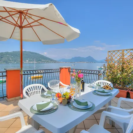 Red House: Beachfront Terrace & Private Beach - Happy Rentals Apartment Baveno
